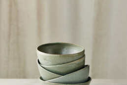 set of bowls with a semimatte green glaze